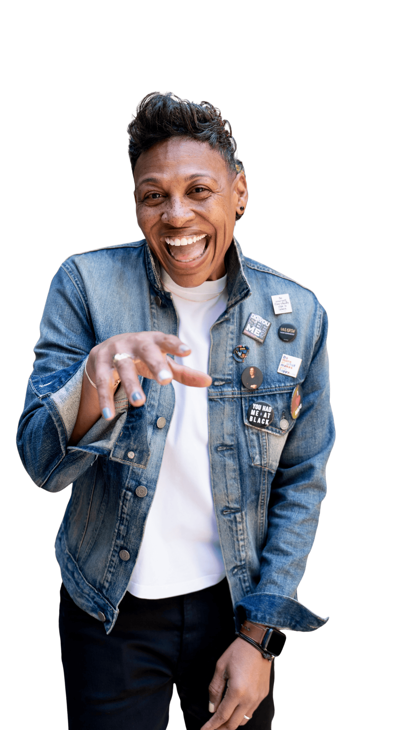 Khaliah O. Guillory in a denim jacket, pointing at the camera and laughing