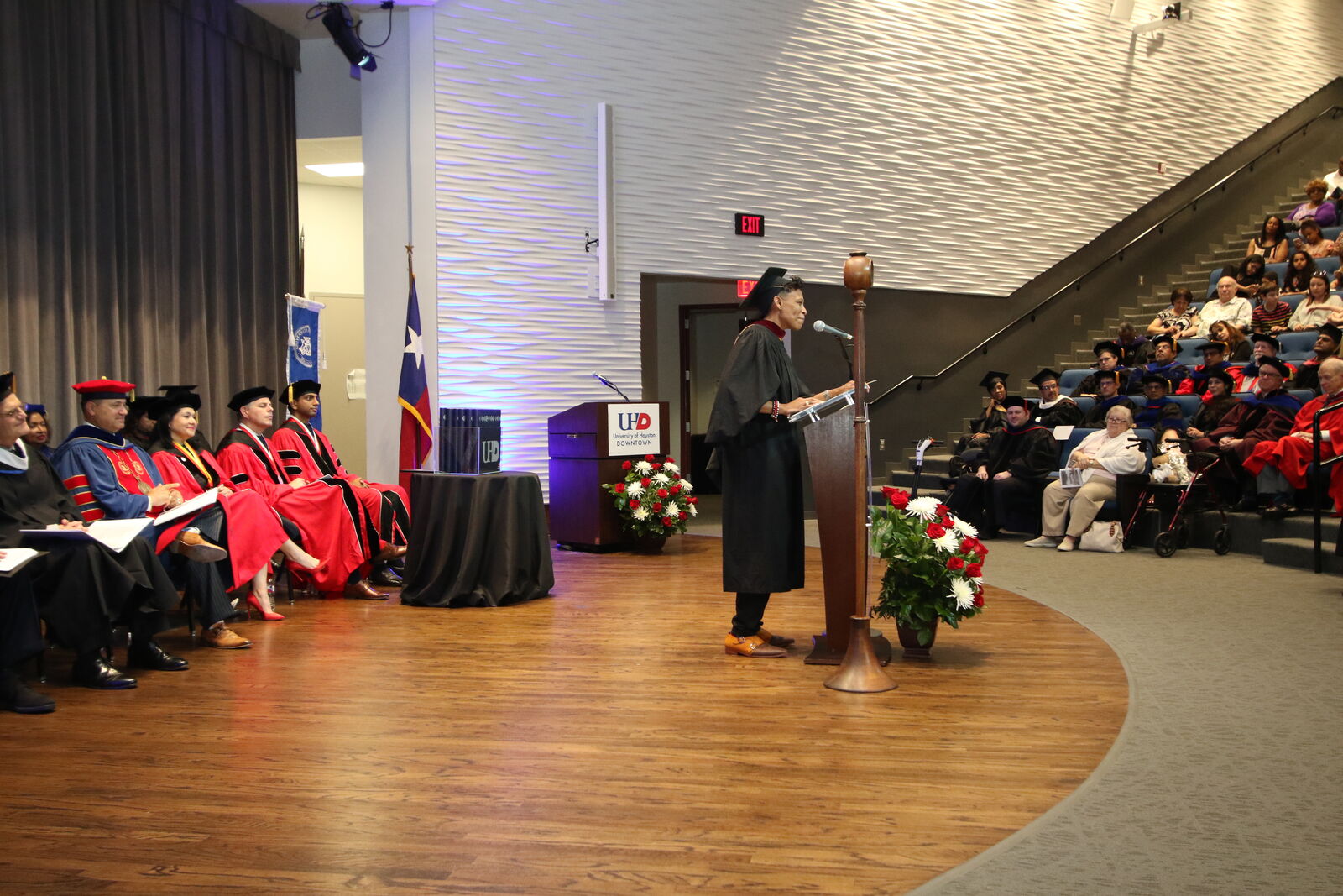 Khaliah O. Guillory delivering a commencement speech