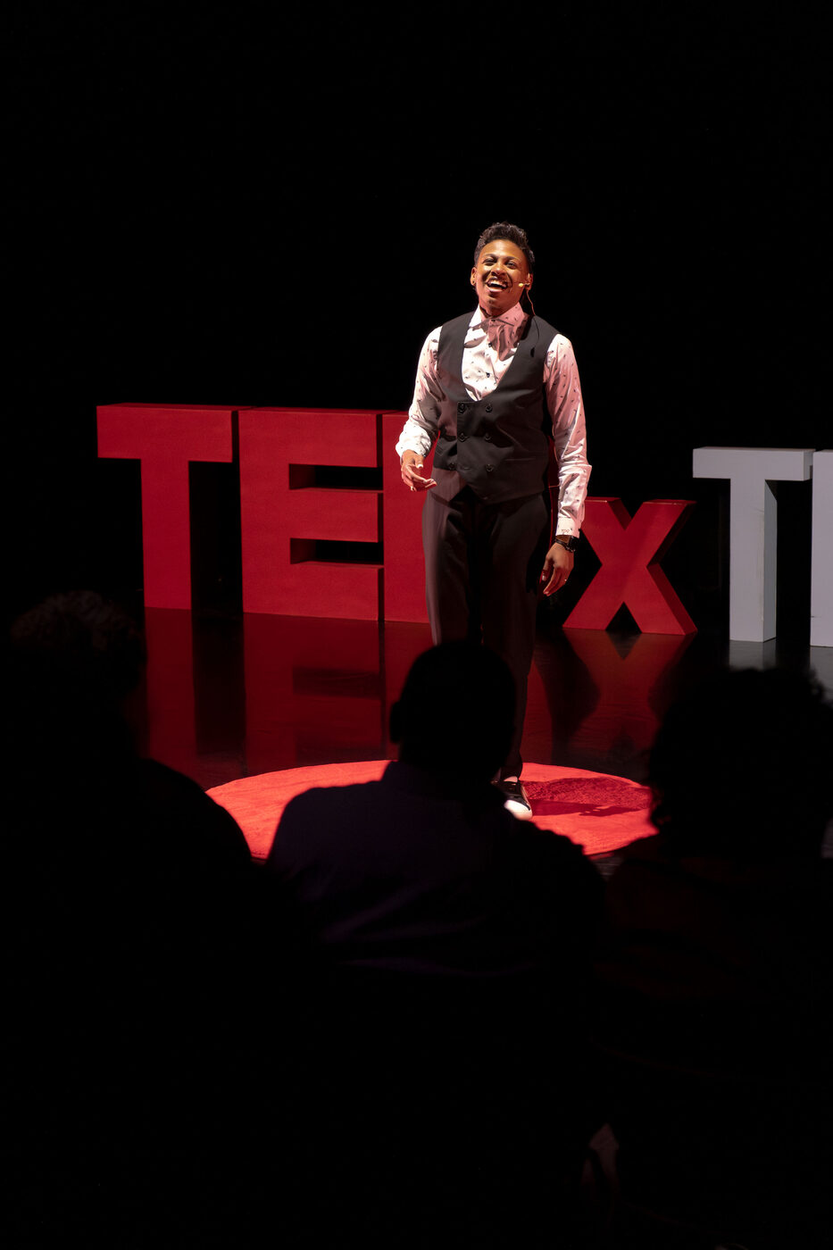 Khaliah O. Guillory speaking on stage