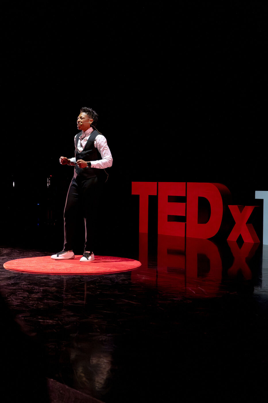 Khaliah O. Guillory laughing on stage