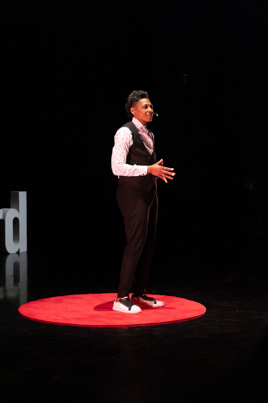 Khaliah O. Guillory laughing on stage